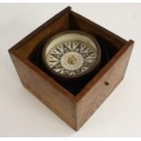 A late 19th/early 20th century nautical gimbal compass, dry card scale, the dovetailed oak case 15.