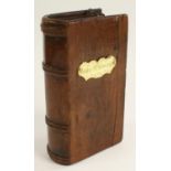 A 19th century mahogany novelty book shaped box, enclosing a secret compartment,