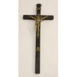 A 19th century bronze Corpus Christi, ebony cross, 22.