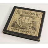 An early 20th century portable draughts set, The Portable Set, turned ring shaped pieces,