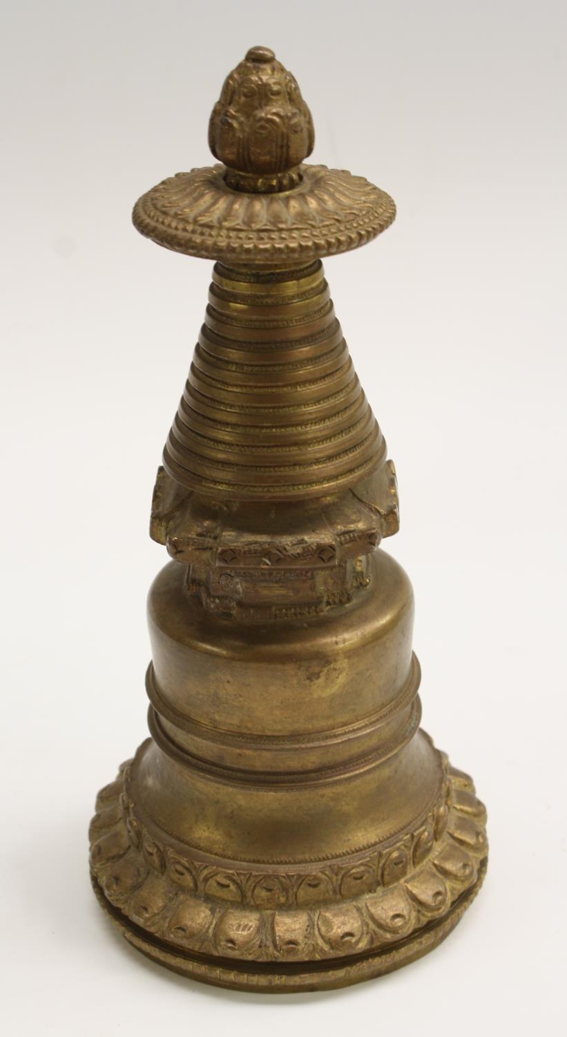 A Nepalese gilt bronze Buddhist temple ritual object, lotus base,