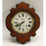 A 19th century French walnut and ebonised shaped oval 'vineyard' clock,