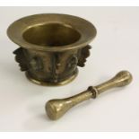 A 17th century bronze pestle and mortar,