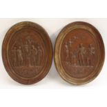 A pair of 19th century bronzed oval plaques, in the Grand Tour taste,
