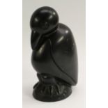 An Inuit grey-black serpentine carving, of a stylised bird, signed to base Edward?,