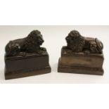 A pair of museum-type composition models, of lions, recumbent to left and right, 17.