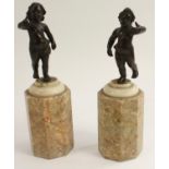 French School (19th century), a pair of dark patinated bronzes, of scantily clad putti,