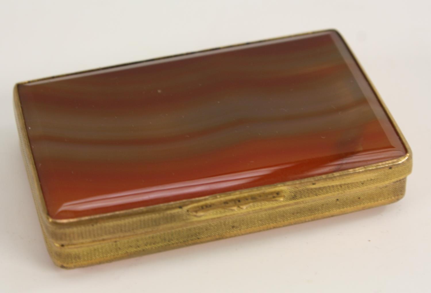 A 19th century gilt metal mounted agate rounded rectangular snuff box,