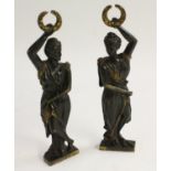 A pair of 19th century French Empire dark and gilt-patinated bronze mounts,
