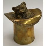 A late 19th century gilt bronze and brass novelty box or caddy, as a cat asleep in a top hat,