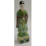 A Chinese famille verte porcelain figure, of an Immortal,