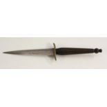 A Fairbairn Sykes type commando fighting knife, 14cm double-edged blade,