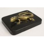 A 19th century bronze-mounted desk weight, as a lizard,