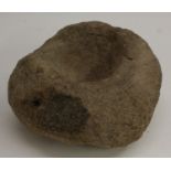 A Medieval granite quern stone/mortar,