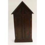 A Gothic Revival oak key cabinet,