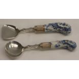 A pair of Rococo Revival silver 'connoisseur mounted' preserve spoons,