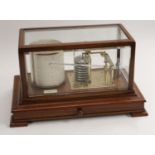 A Victorian walnut eight-bellow barograph, by F Dobson, Newcastle-on-Tyne,