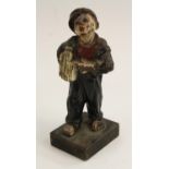Advertising - a Qualcast cast iron figure, cast as a young boy selling newspapers,