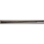 A substantial 19th century Indian matchlock rampart gun barrel, part hardwood stock,
