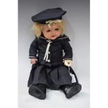 An Armand Marseille 966 composition character doll, flirty brown eyes, open mouth with two teeth,