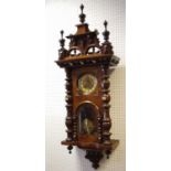 An early 20th century walnut Vienna style wall clock