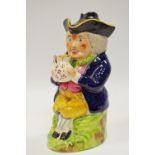 A 19th century Staffordshire Toby jug