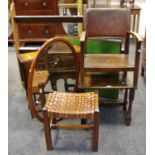 An oak wall rack; a folding games table; a hide seated stool; an oak Sutherland table;