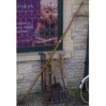 Tools - early 20th century gardening tools, including forks, pick axe, shovels,