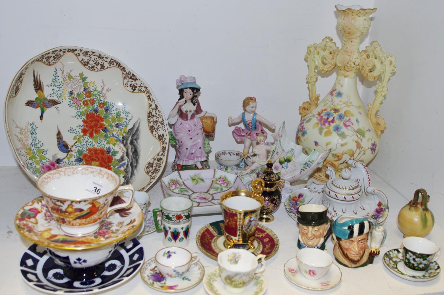 An Augustus Rex 19th century Dresden porcelain figural table salts bowl;