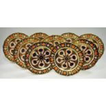 Nine Royal Crown Derby Imari pattern 1126 pattern shaped circular cabinet plates decorated with