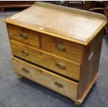A Victorian mahogany chest of two short drawers over two long, replacement handles..