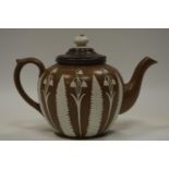 A Victorian globular stoneware teapot, in the manner of Adams,