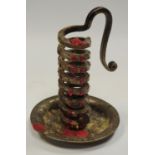 An 18th century style wrought iron spiral chamberstick