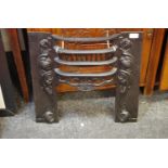 A late Victorian cast iron bedroom fire surround