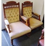 A pair of mahogany fireside chairs, shaped and carved top rail, button upholstered back,