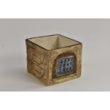 A Troika cube vase by Sally Bart, incised with geometric motifs in shades of blue, brown,