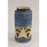 A Troika cylinder vase by Alison Brigden, decorated with a continuous band of angles and zig-zags,