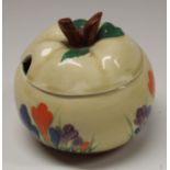 A Clarice Cliff Crocus pattern apple shaped preserve pot and cover,