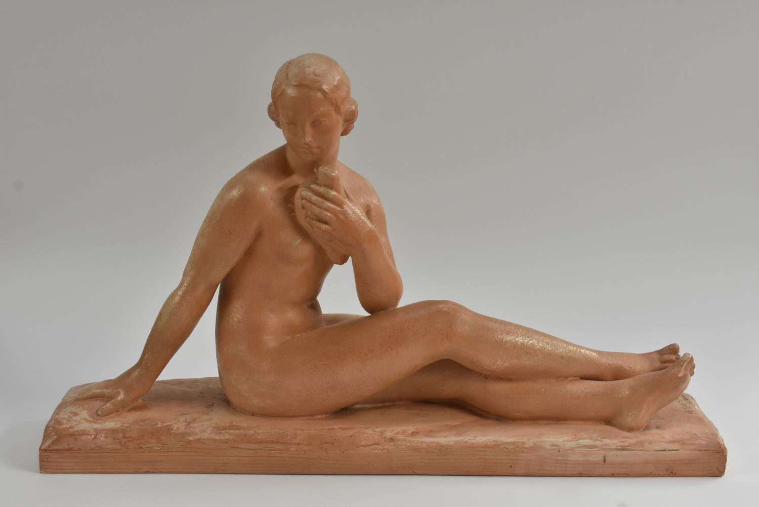 After Bargas, a French Art Deco style model of a resting nude,