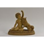 After Rezl, a French painted terracotta group, cherubic child playing with a canine companion,