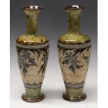 A pair of Doulton Lambeth ovoid vases, designed by Eliza Simmance incised with flowers and foliage,