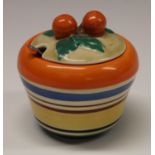 A Clarice Cliff waisted preserve pot and cover, banded in colours, orange finial, 7.