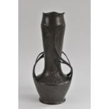 A late 19th/ early 20th century Art Nouveau pewter twin handled vase,