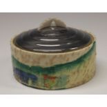 A Clarice Cliff Patina pattern preserve pot and cover, decorated with a dripped glaze,