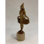 In the manner of Josef Lorenzl, an Art Deco gilt patinated bronze and onyx figure,