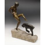 Marcel Guillemard (1887 - 1966), a dark patinated bronze, of a naked lady with young goat,