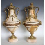 A large pair of urnular gilt metal mounted marble cassolletes,