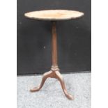 A George III style mahogany wine table, moulded 'pie-crust' top, fluted cylindrical column,