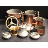 Metalware - a Middle Eastern waisted cylindrical copper pitcher; a similar copper cauldron;