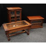 An Old Charm oak bookcase/media cabinet; another, similar,